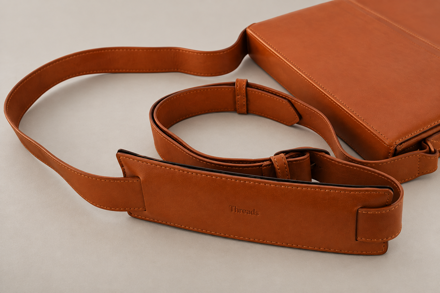 byThreads leather shoulder bag and strap, close up